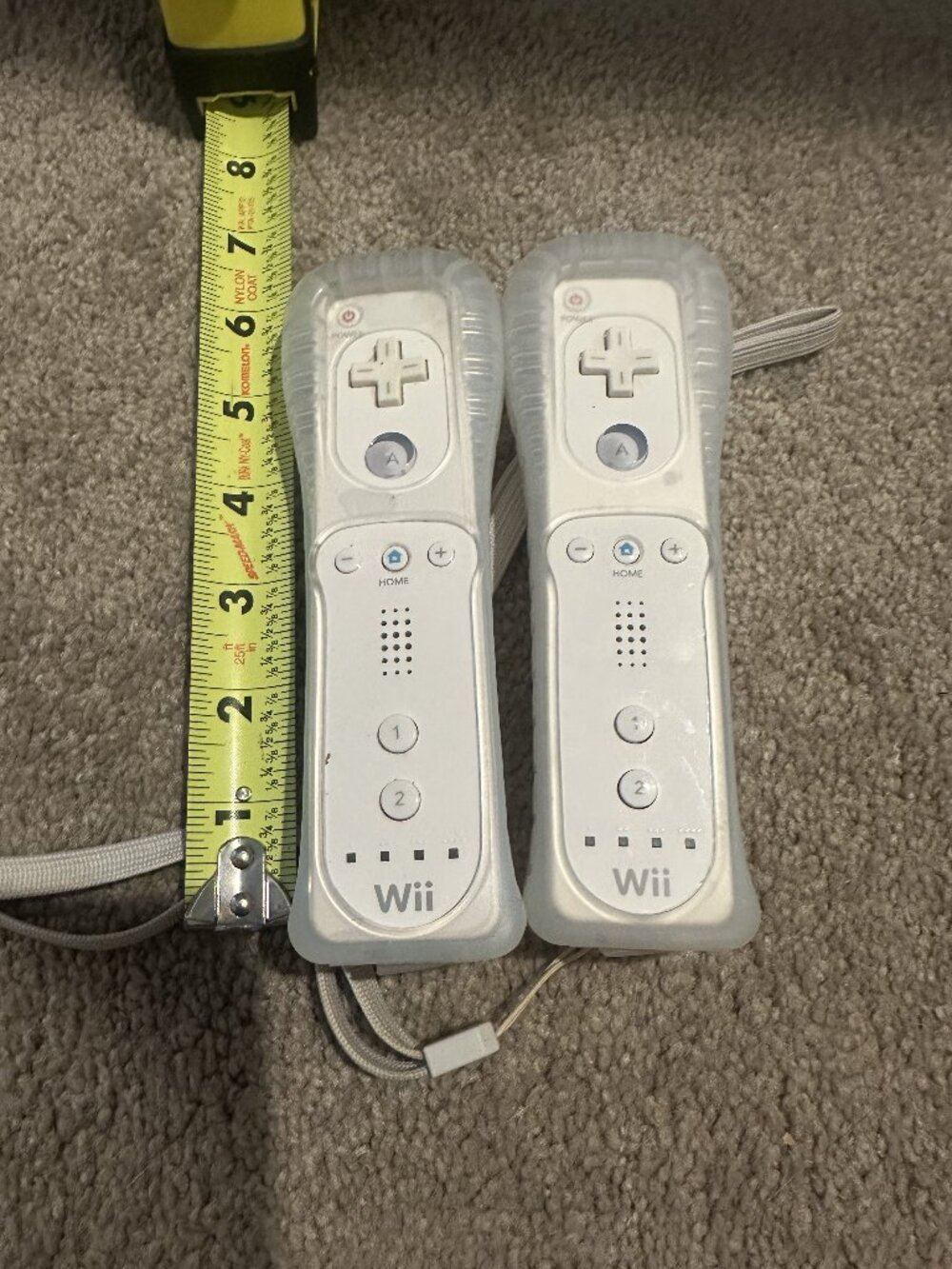 Nintendo Wii Remotes Lot of 2 with Sleeves